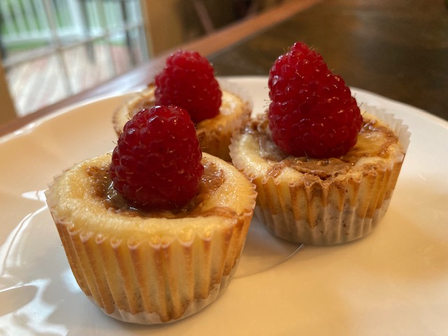 Mini Raspberry and Almond Butter Swirl Cheesecakes